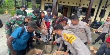 Perkuat Sinergi TNI-Polri Dan Masyarakat, Polsek Waris Gelar Halal Bihalal Dan Musnahkan Miras Hasil Razia