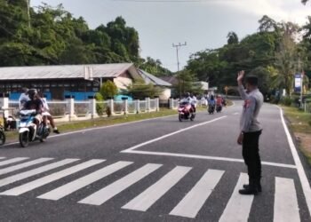 Satlantas Polres Waropen Intensifkan Strong Point Pagi, Wujudkan Lalu Lintas Aman dan Tertib 
