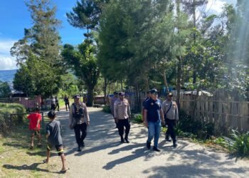 Polres Tolikara Gelar Patroli Humanis Saat Hardiknas, Wujudkan Karubaga Aman Dan Kondusif 
