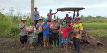 Dukung Ketahanan Pangan, Polsek Kurik Manfaatkan Lahan Produktif untuk Penanaman Jagung dan Rumput Gajah 