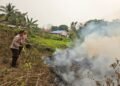 Respons Cepat Polsek Tanah Miring, Karhutla Dekat Permukiman Berhasil Dipadamkan